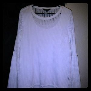 White sweater and tank top underneath